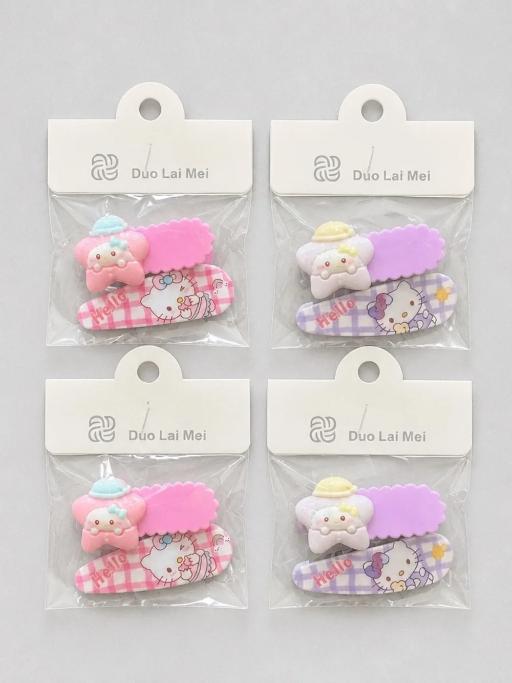 NWT Set of 4 Hello Kitty Child Size Hair Clips Barretts Pink & Purple